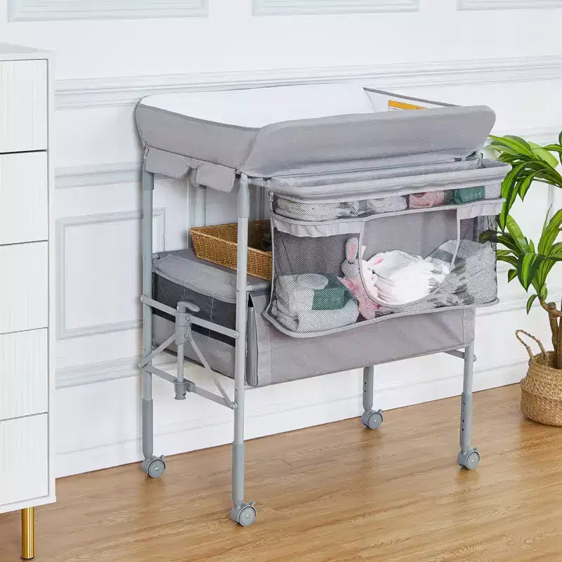Fasciatoio portatile pieghevole in poliestere con ruote e 2 cassetti 80x61 cm