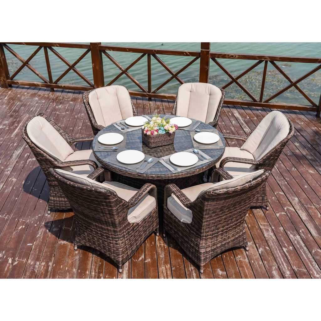 Set da pranzo rotondo da esterno in 7 pezzi in vimini di rattan con cuscini di Moda Furnishings